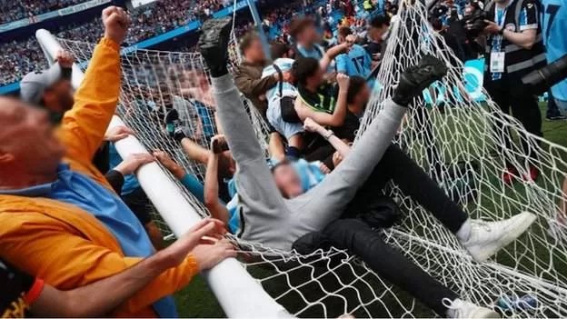 Man City charged for final-day pitch invasion